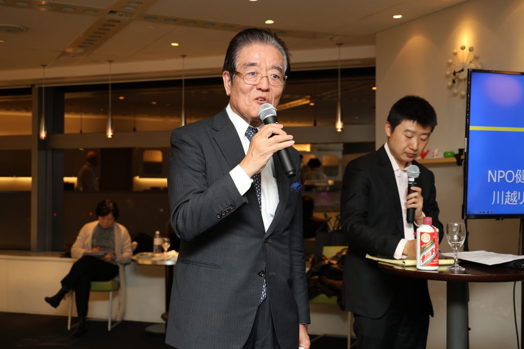 来賓挨拶をする清水昭NPO健康医療開発機構理事長・川越リハビリテーション病院院長